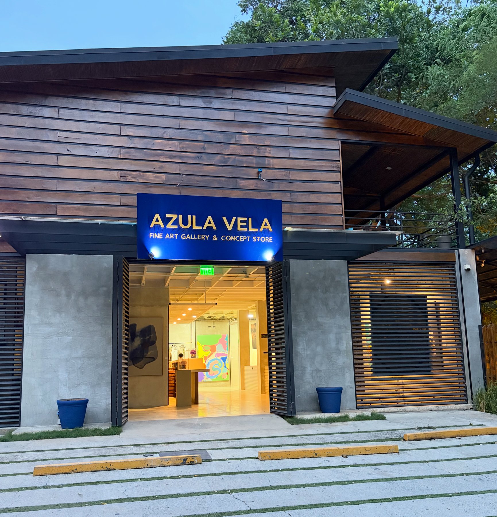 Azula Vela facade at dusk