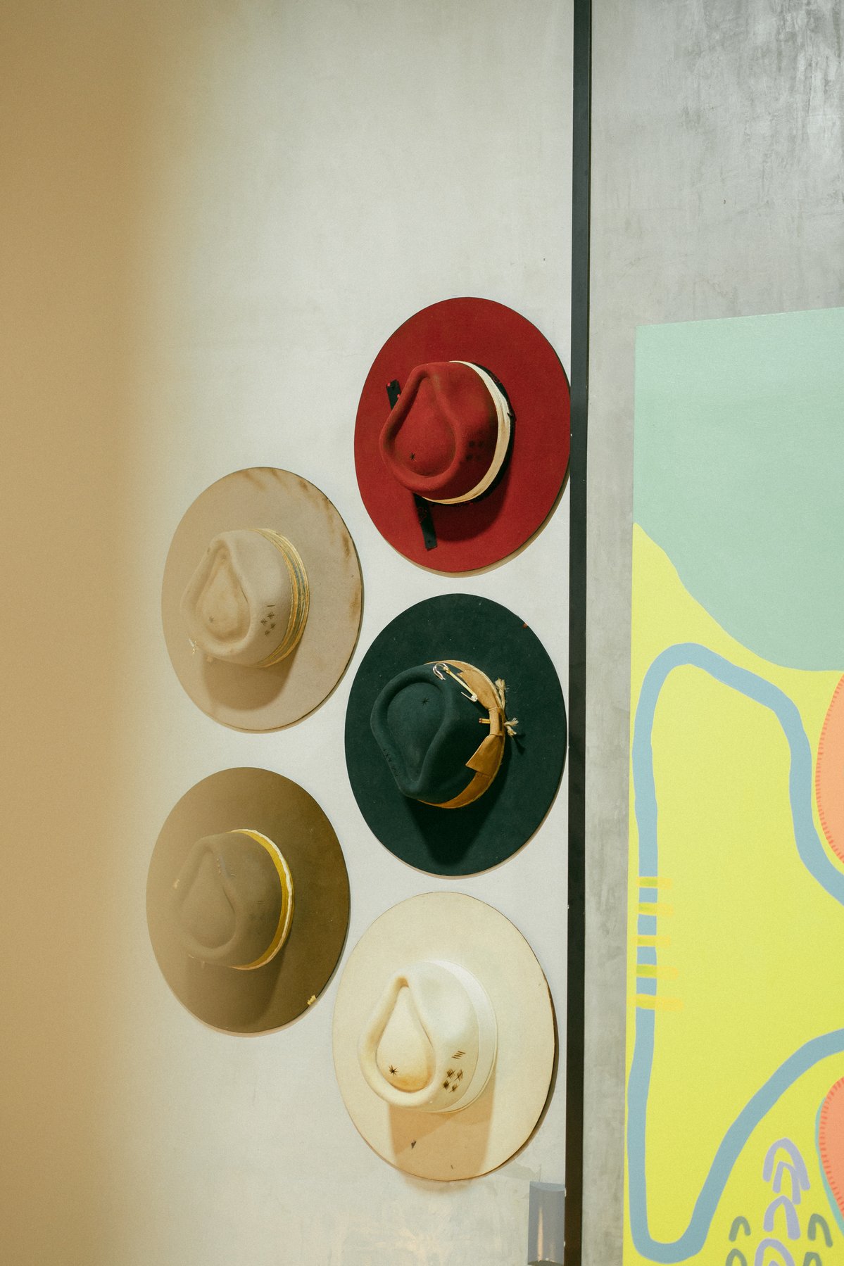Gallery corner with abstract paintings